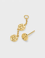 tripple disk adaptable stud earring with drop on a grey background